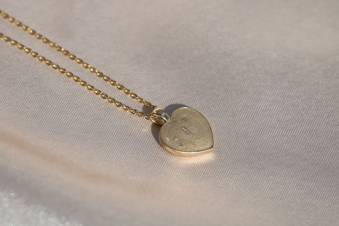 Gold keepsake necklace